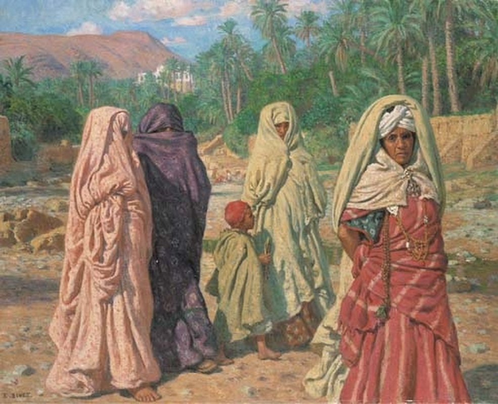 Donne attraversano il letto asciutto del wadi Bou - Saada